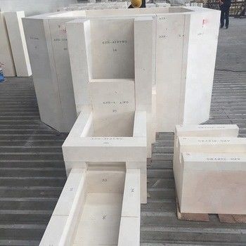 Bloc AZS de fusion de verre réfractaire avec réfractabilité de 1770° à 2000° et teneur en CaO de 0,3-1%